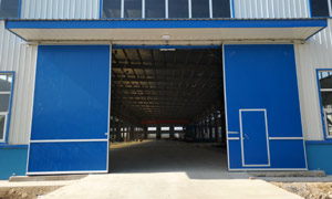 河南四建股份公司工業(yè)雙開推拉門案例 - 中出網(wǎng)-智能出入口門戶